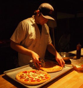Slicing Delicious Pizza